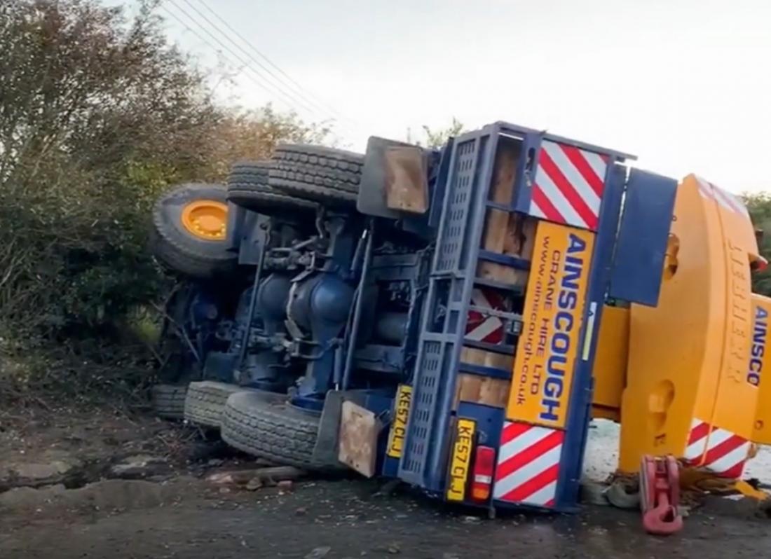 Crane accident closes road