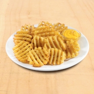 Πατάτες Crosscut με Cheddar sauce