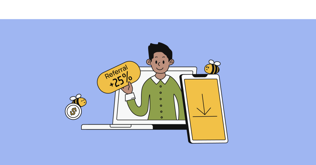 um jovem em pé no laptop, com o telefone por perto