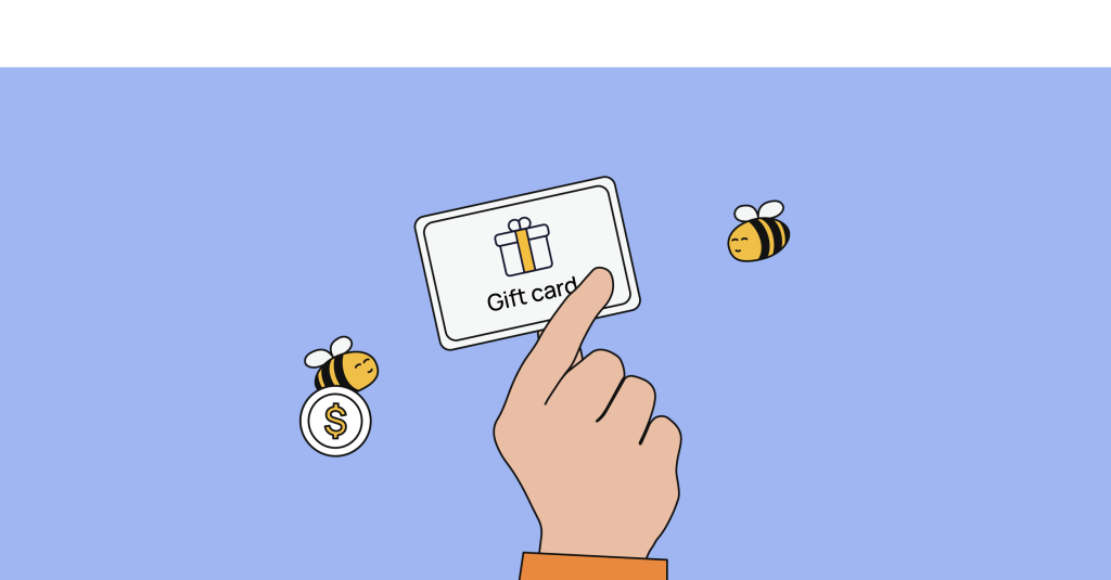 une main tenant une carte cadeau