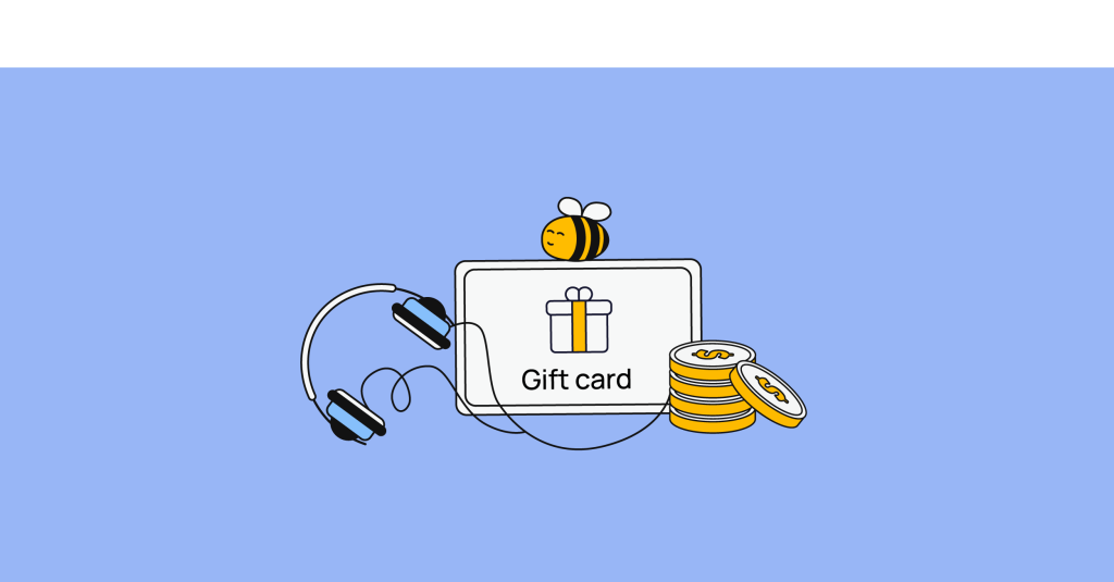 carte cadeau, écouteurs et pièces de monnaie