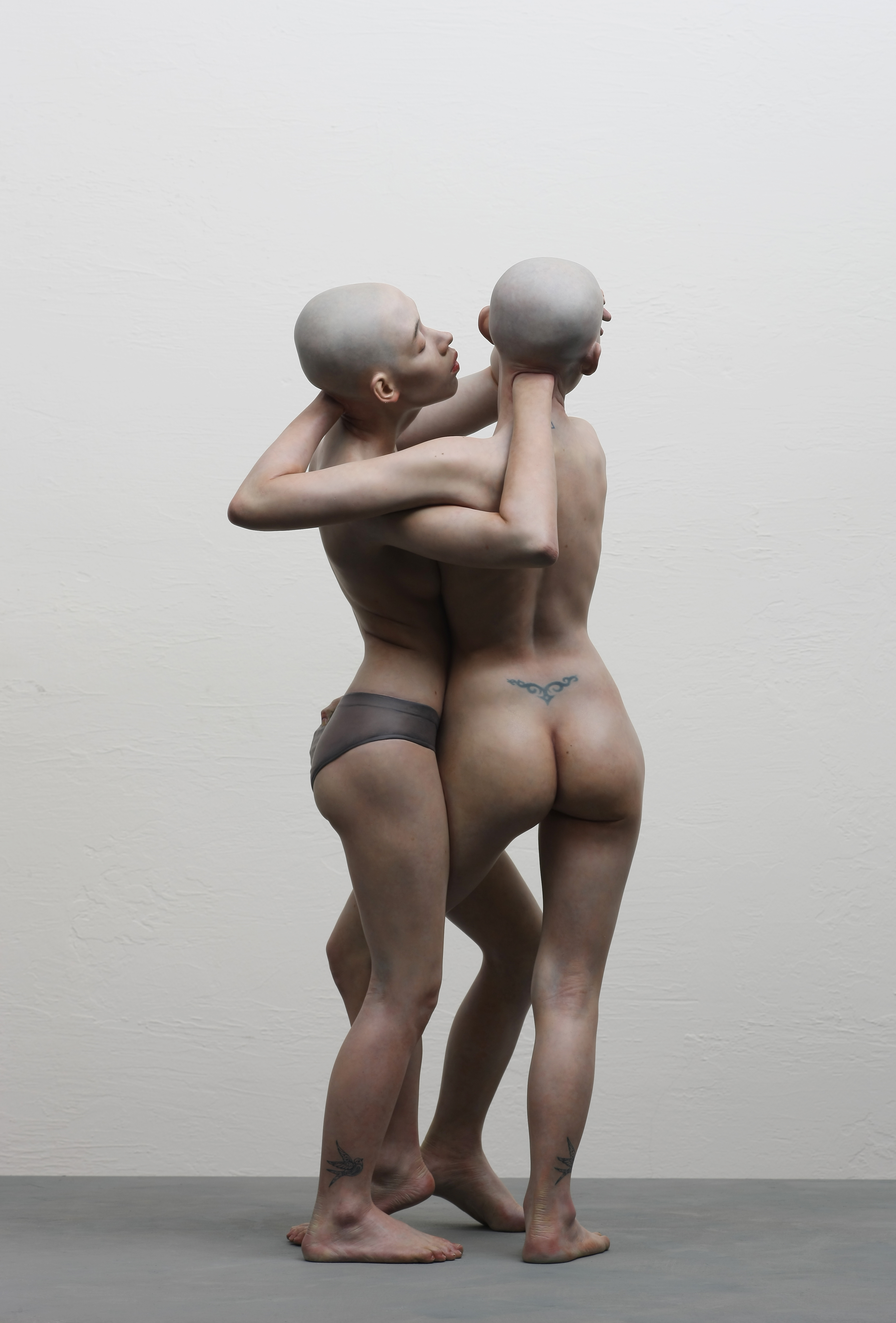 1454784147_Isometric_Female_2013_back___38w_x_38w_x_89h_cm__Oil_on_Resin