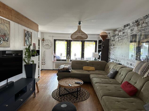 Familienfreundliche Maisonette-Wohnung mit Garten, Garage und Stellplatz