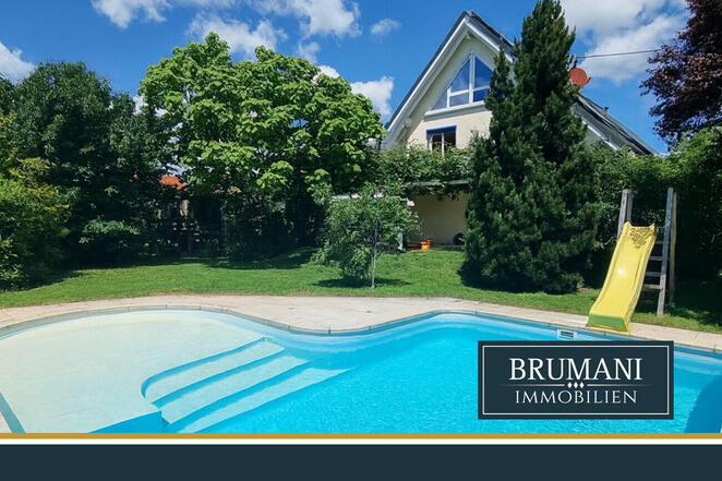 BRUMANI | Modernes Einfamilienhaus mit hochwertigem Anbau, Doppelgarage und Pool in Buggingen