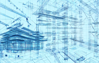 A construction site with tools and a foreman's hard hat placed on a blueprint