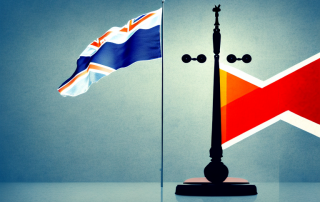 A scale balancing a german flag on one side and a british flag on the other