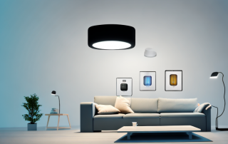 A modern home interior showcasing various smart home lighting systems such as table lamps