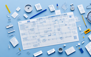 A blueprint with various project planning tools like a calendar