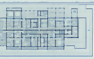 A blueprint with various architectural symbols and measurements