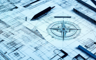 A drafting table with blueprints