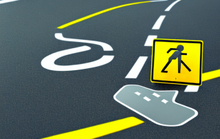 A car on a road with common accident-causing elements around it like a slippery road