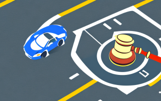 A car on a road intersected by a gavel