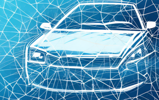 A car with a cracked windshield and a close-up view of a repair tool