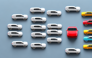 Various types of cars arranged in a hierarchy on a table