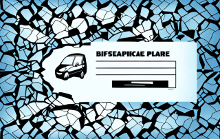 An empty parking space with broken glass on the ground