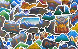 A variety of colorful and unique berg gokart stickers placed on a mountain-themed go-kart