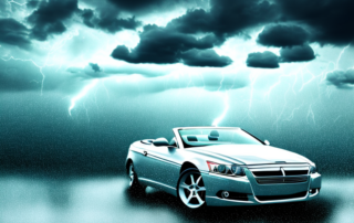 A convertible car under a protective shield