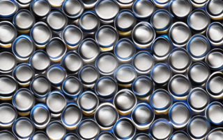 Various car rims wrapped in different types of protective foils