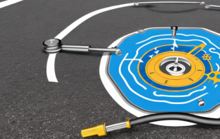 A car tire with a pressure gauge attached to it