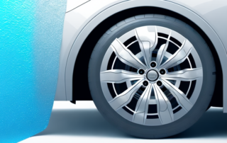 A car wheel being wrapped in a glossy