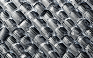 Several high-quality carbon fiber film rolls displayed prominently