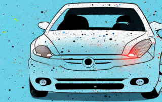 A car with visible patches of foreign paint on its surface