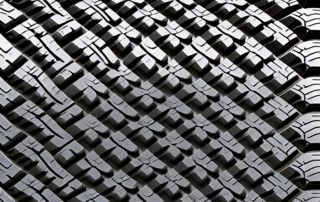 A variety of bridgestone tires with a pressure gauge