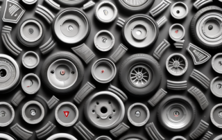 Several types of car tires displayed in a bar setting