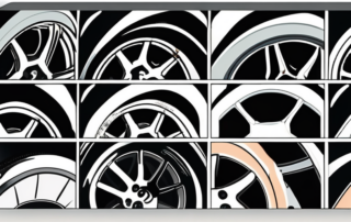 An alloy wheel with a spatula and filler material next to it