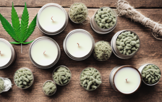 A variety of hemp pain relief salves displayed on a rustic wooden table