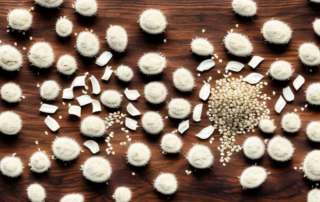 Peeled hemp seeds scattered on a wooden table