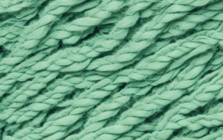 Hemp fibers being transformed into a piece of clothing