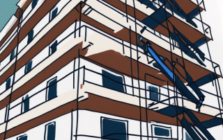 An apartment building under renovation with scaffolding