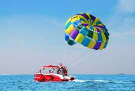 Skybound Thrills: Parasailing Discounts with Beach