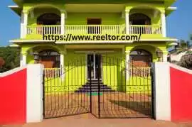What are the reasons for buying property through R, New Delhi