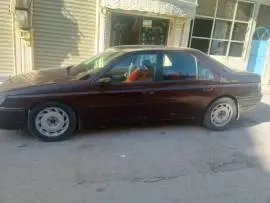 بيجو 605 1990