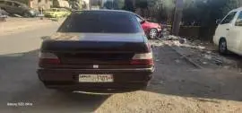 بيجو 605 1990