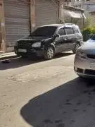 كيا كاريز 2004
