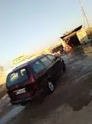كيا كرنفال 2000