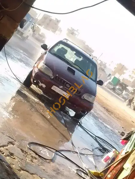 كيا كرنفال 2000