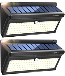 Lampada Solare da Esterno, 100 LED Super Luminosa Luci Solari con Sensore di Movimento 2400mAh, Wireless Impermeabile Lampade Solari a Led da Esterno con Grandangolo(2 Pacchi)-Luscreal - 1